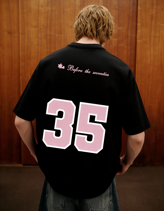 Reimagined Printed Black Oversized T-Shirt Main Character