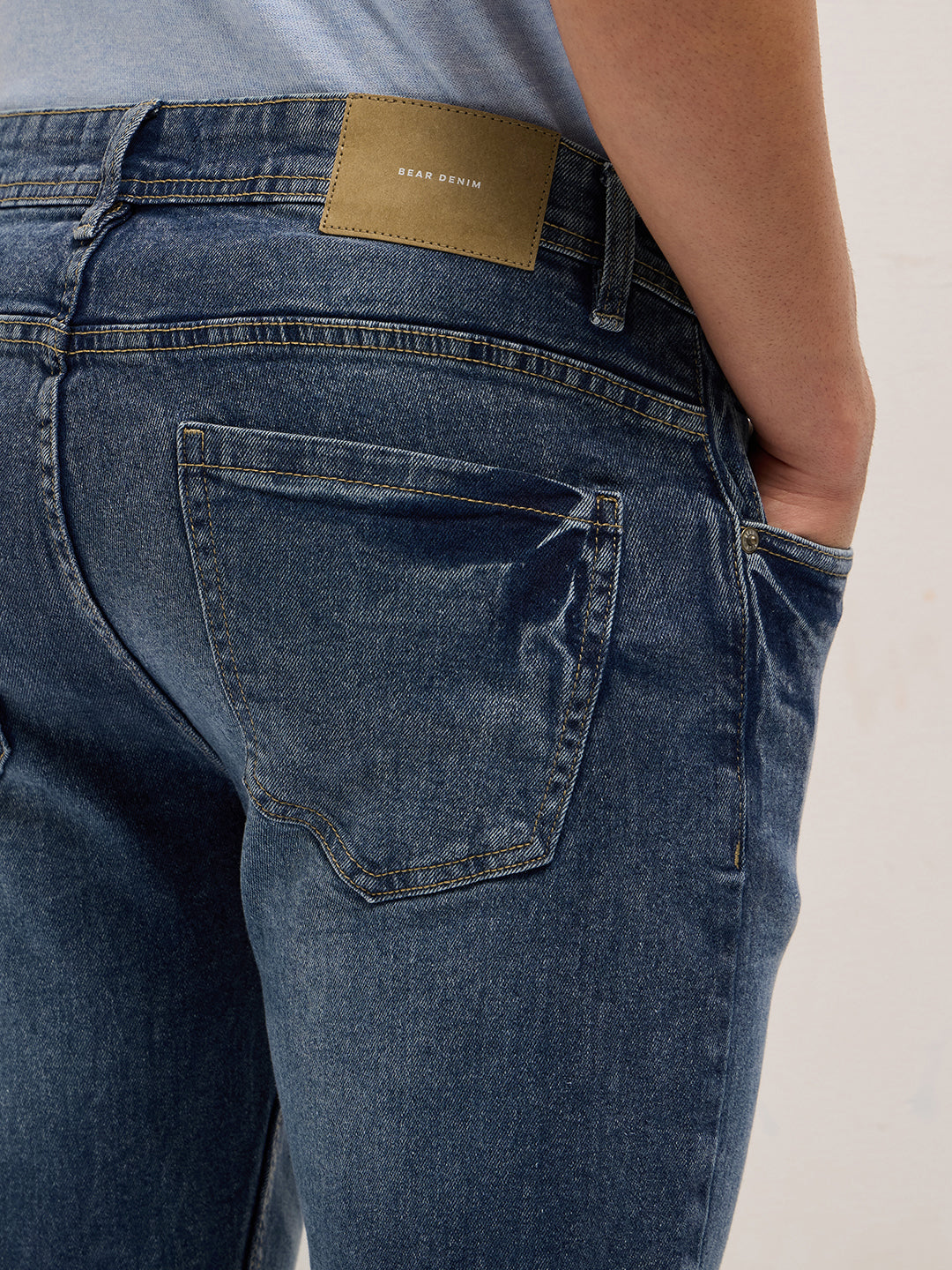 Mid Blue Mid-Rise Slim Fit Jeans with Lightly distressed