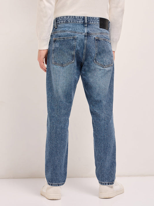 Light Blue with Light Fade Distressed Mid-Rise Relaxed Fit Jeans