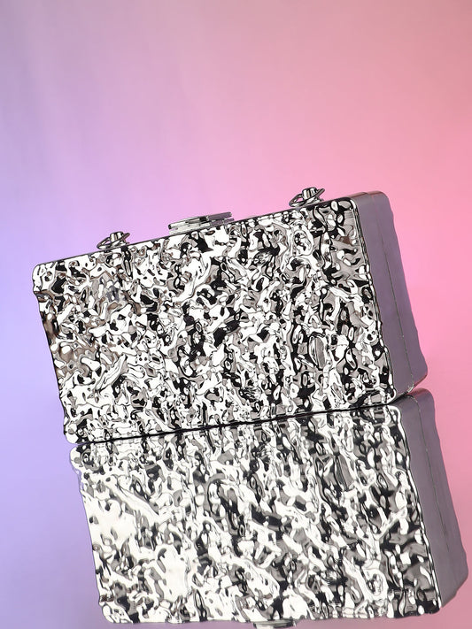 The Dented Chain Clutch Bag - Metallic Silver