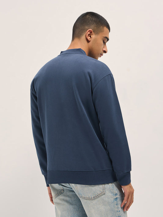 Blue Solid Relaxed Fit Henley Neck T-Shirt with Ribbed Hem and Cuffs