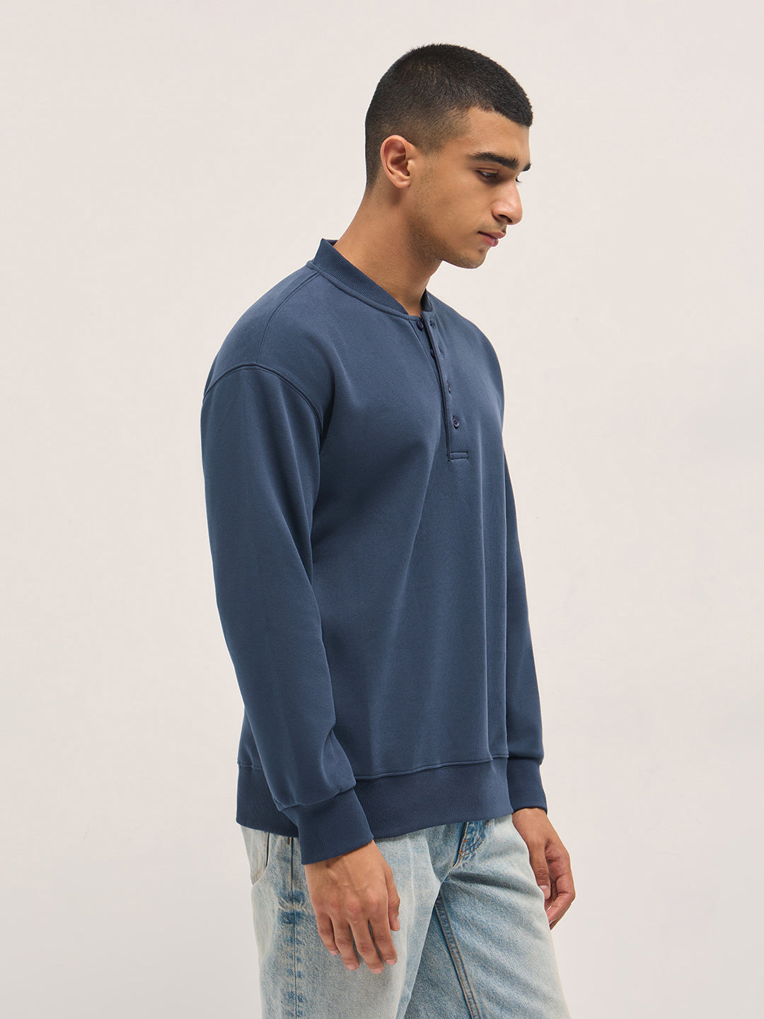 Blue Solid Relaxed Fit Henley Neck T-Shirt with Ribbed Hem and Cuffs