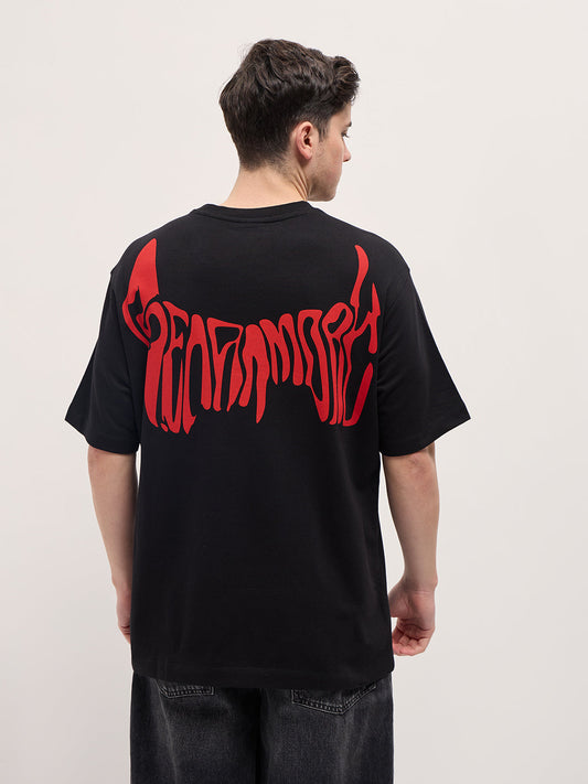 Black Graphic T-Shirt with Bold Red Abstract Design