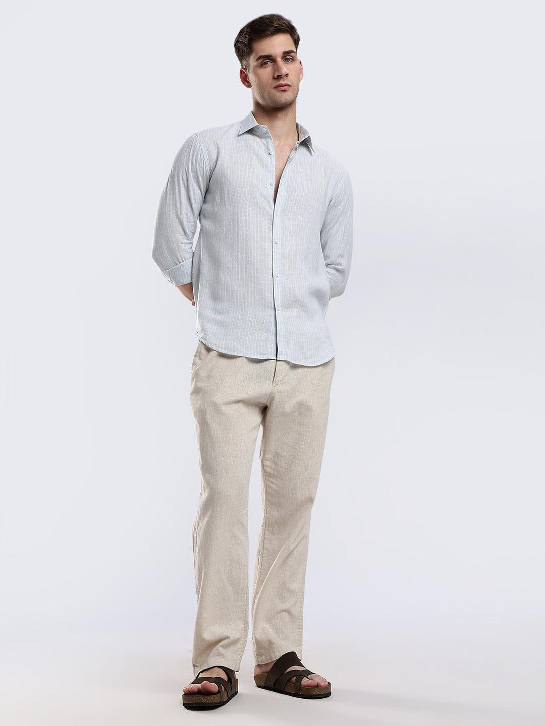 Stylera breathable light blue button-up shirt with a subtle vertical weave texture.