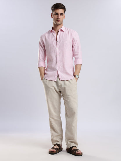 Stylera breathable light pink button-up shirt featuring a subtle vertical weave texture.