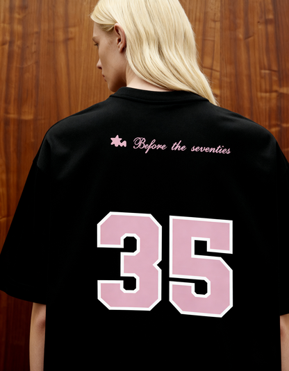 Reimagined Printed Black Oversized T-Shirt Main Character