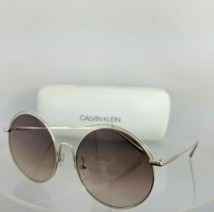 Calvin Klein Jean UV-Protected Grey Round Shiny Gold Framed Sunglasses