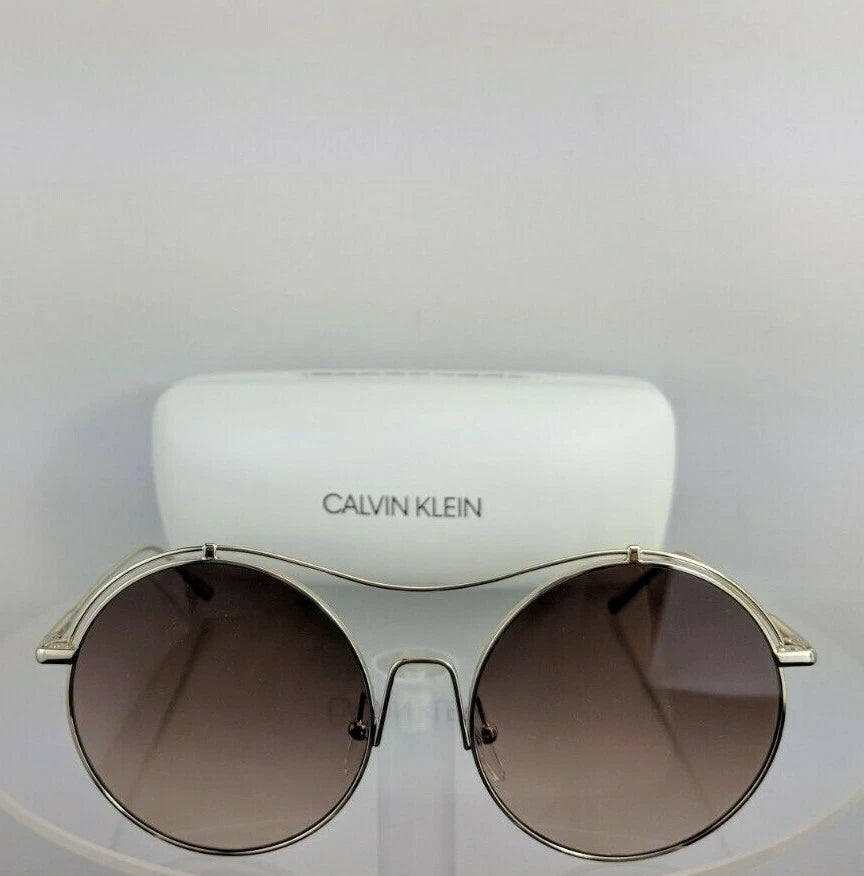 Calvin Klein Jean UV-Protected Grey Round Shiny Gold Framed Sunglasses