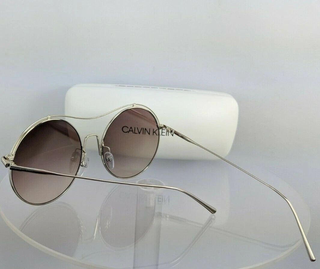 Calvin Klein Jean UV-Protected Grey Round Shiny Gold Framed Sunglasses