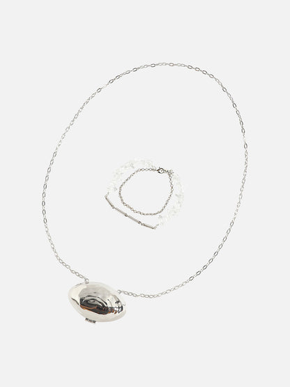 Metallic Magic: Enhancing Style with a Bodychain and Mini Purse