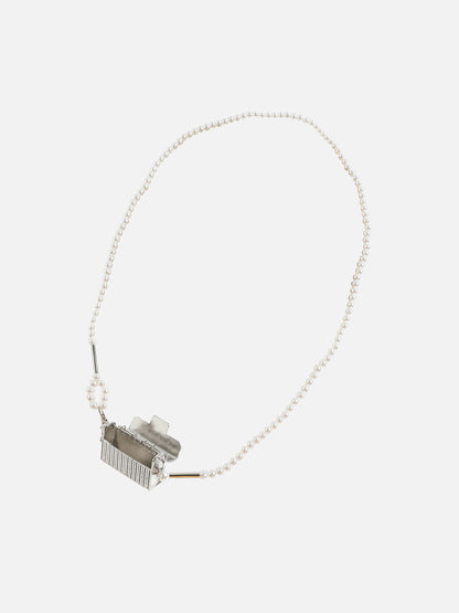 Dazzling Allure: Adorning With A Metallic Bodychain & Mini Purse