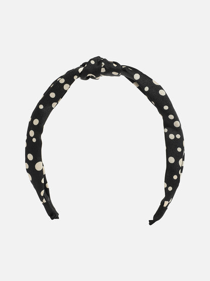 Glittering Accessory: The Embellished Hairband of Glamour