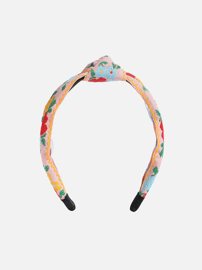Sleek and Simple: Elevating Your Hairstyle with a Fabric Hairband