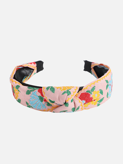 Sleek and Simple: Elevating Your Hairstyle with a Fabric Hairband