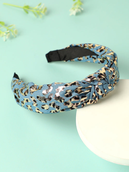 Glistening Charm: Accentuating Style with an Embellished Hairband