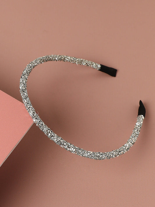 Crowning Glory: The Embellished Hairband Exquisite