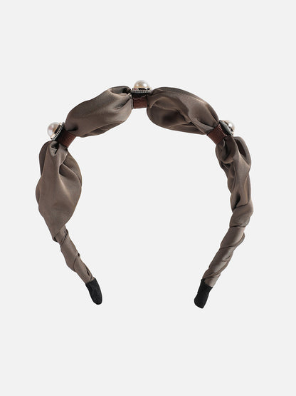 Sparkling Tresses: Adorning with an Embellished Hairband