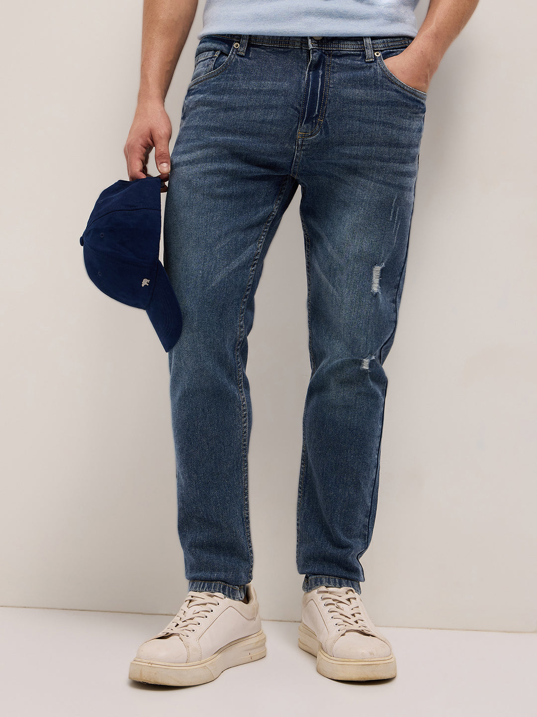 Mid Blue Mid-Rise Slim Fit Jeans with Lightly distressed
