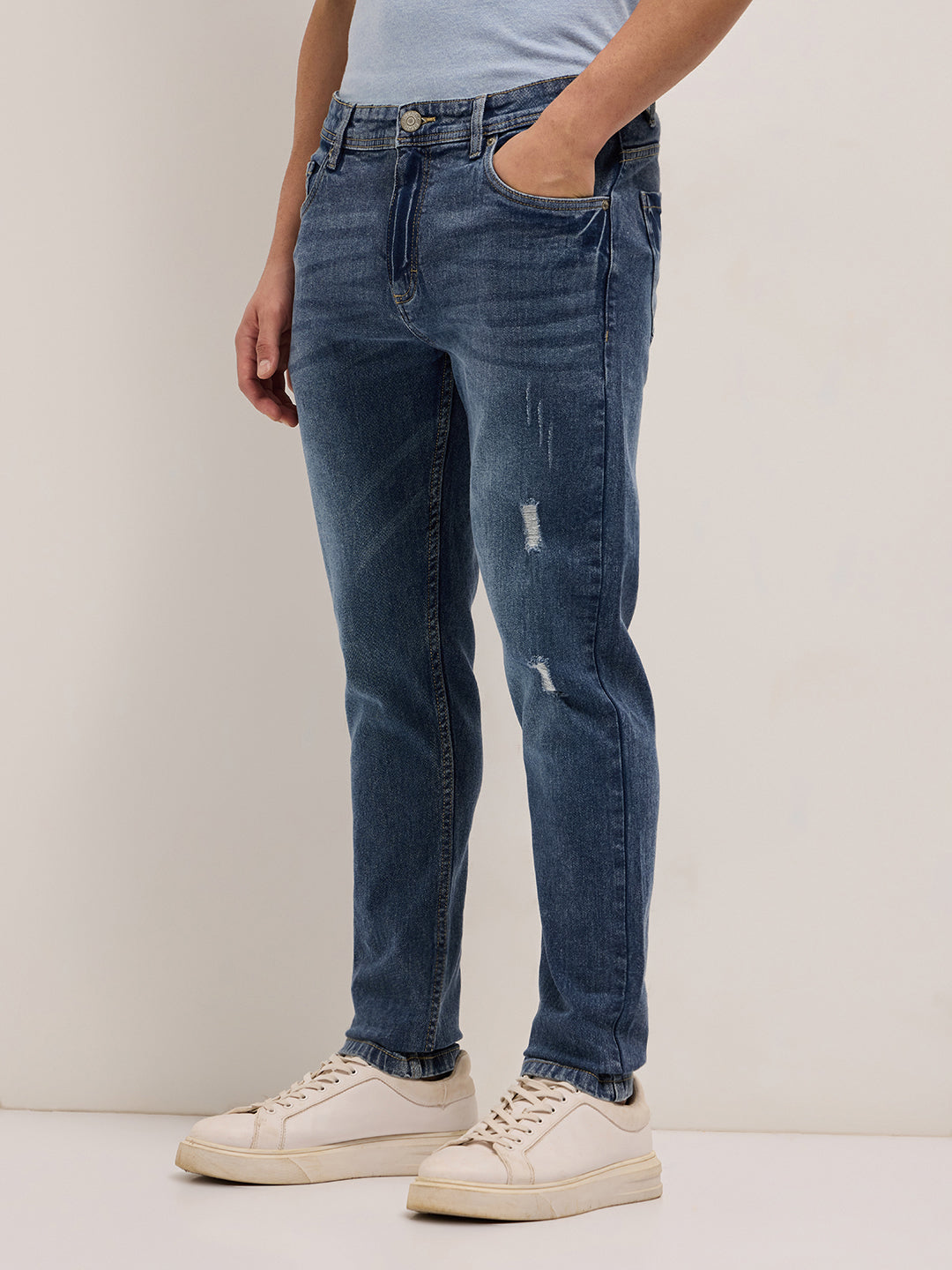 Mid Blue Mid-Rise Slim Fit Jeans with Lightly distressed