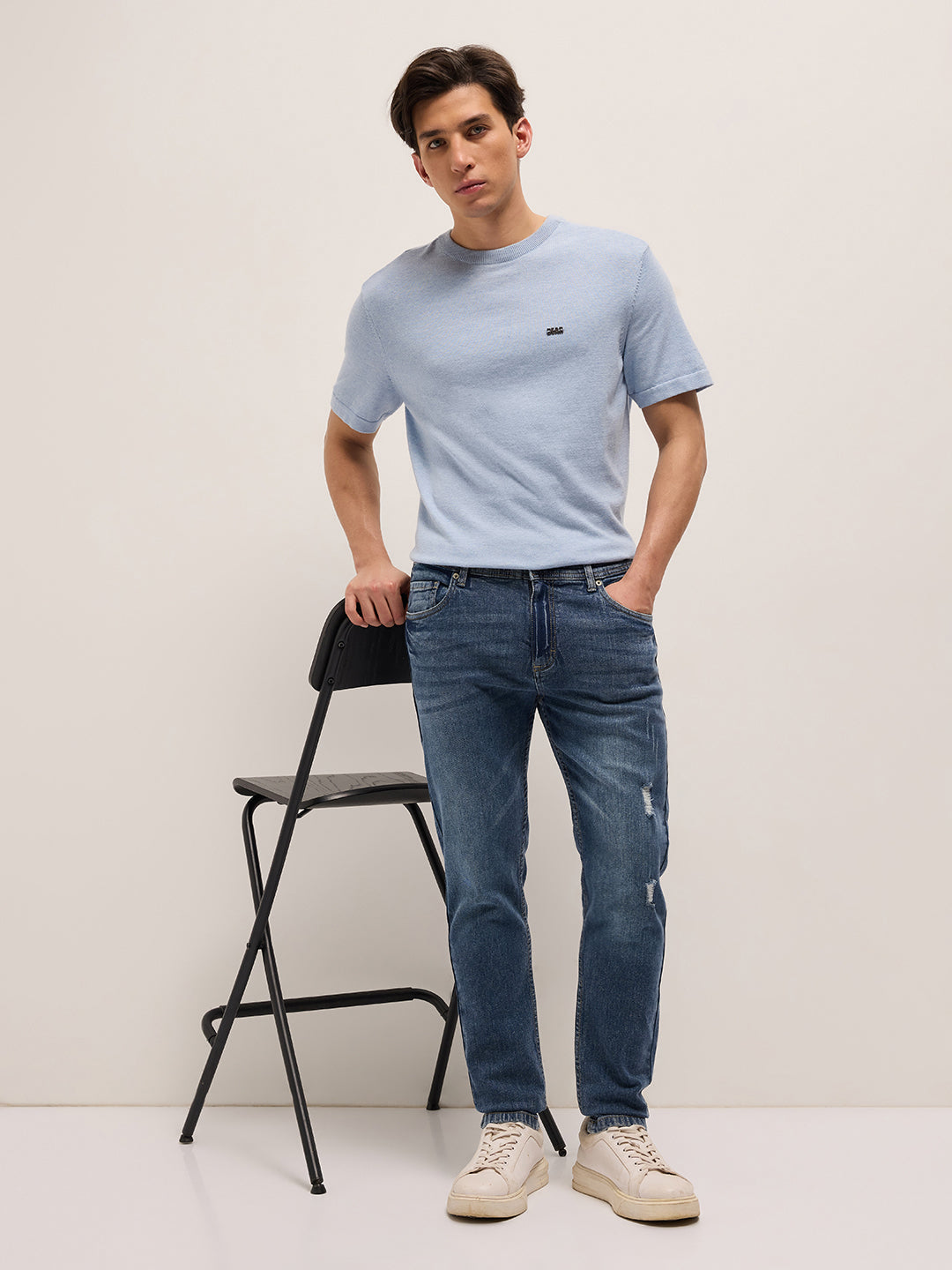Mid Blue Mid-Rise Slim Fit Jeans with Lightly distressed