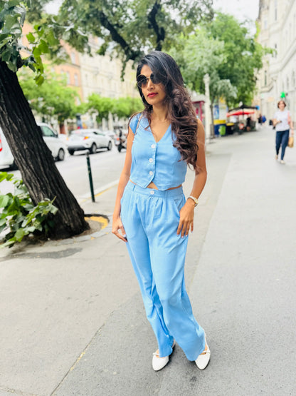 Female model wearing a light blue co-ord set from Stylera