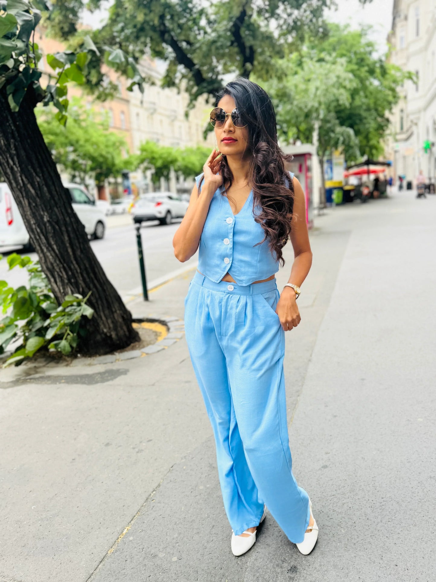 Female model wearing a light blue co-ord set from Stylera