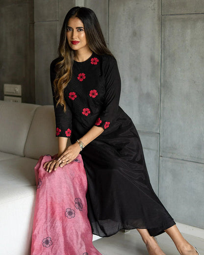 Trendy black muslin suit set with delicate pintuck patterns