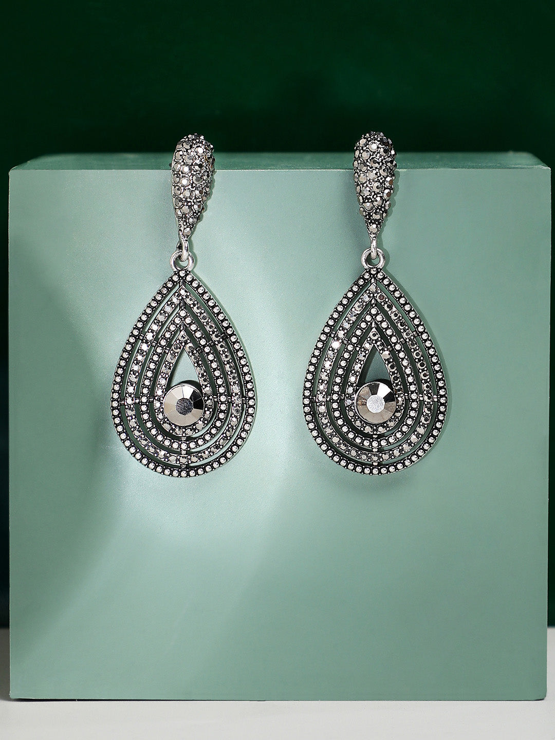 Silver-Toned Stone-Studded Teardrop Shaped Drop Earrings