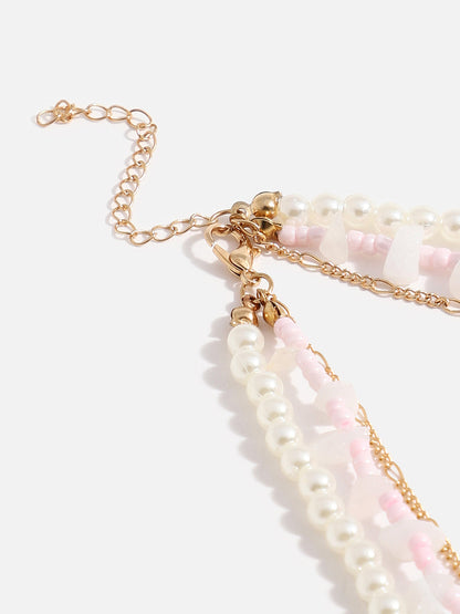 MULTI LAYERED WHITE BEADED NECKLACE