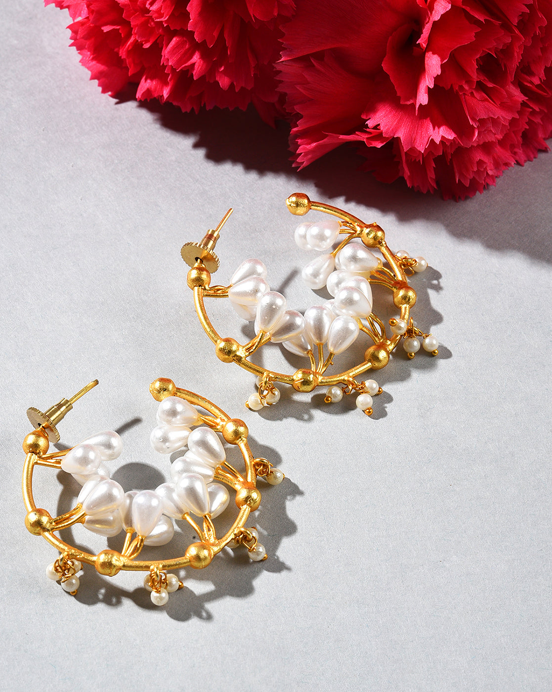 Reverse pearls hoop earrings