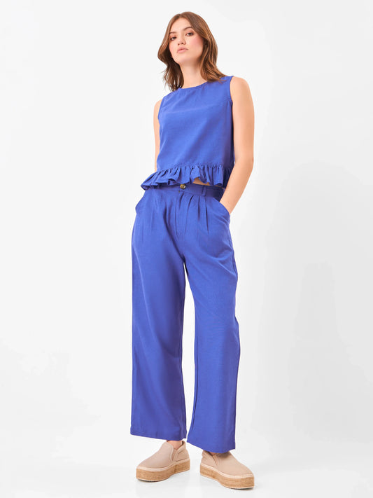 Female model wearing a blue outfit from Stylera