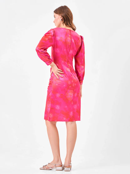 Female model wearing a pink tie-dye dress from Stylera, showcasing backside