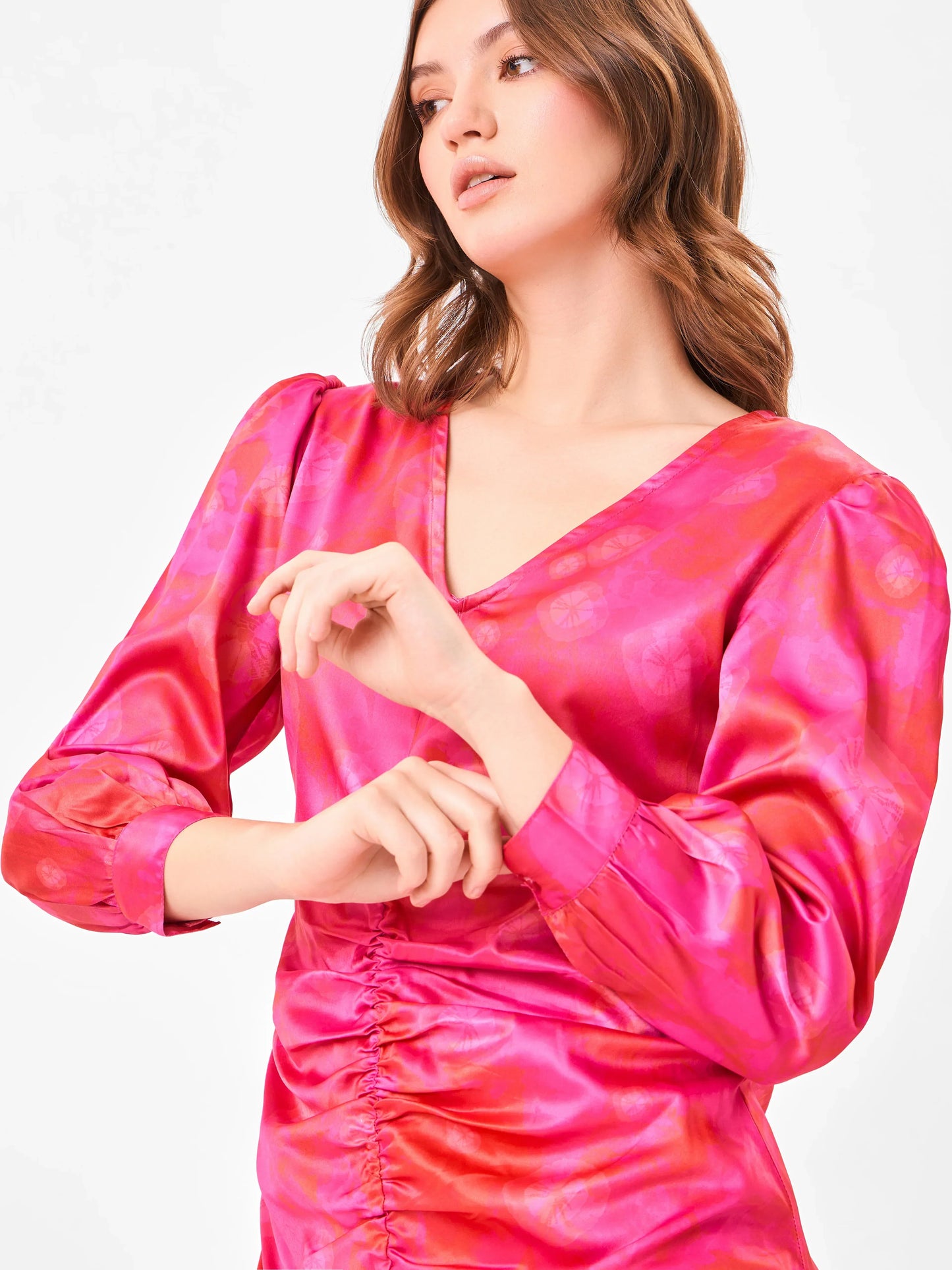Female model wearing a pink tie-dye sheath dress from Stylera
