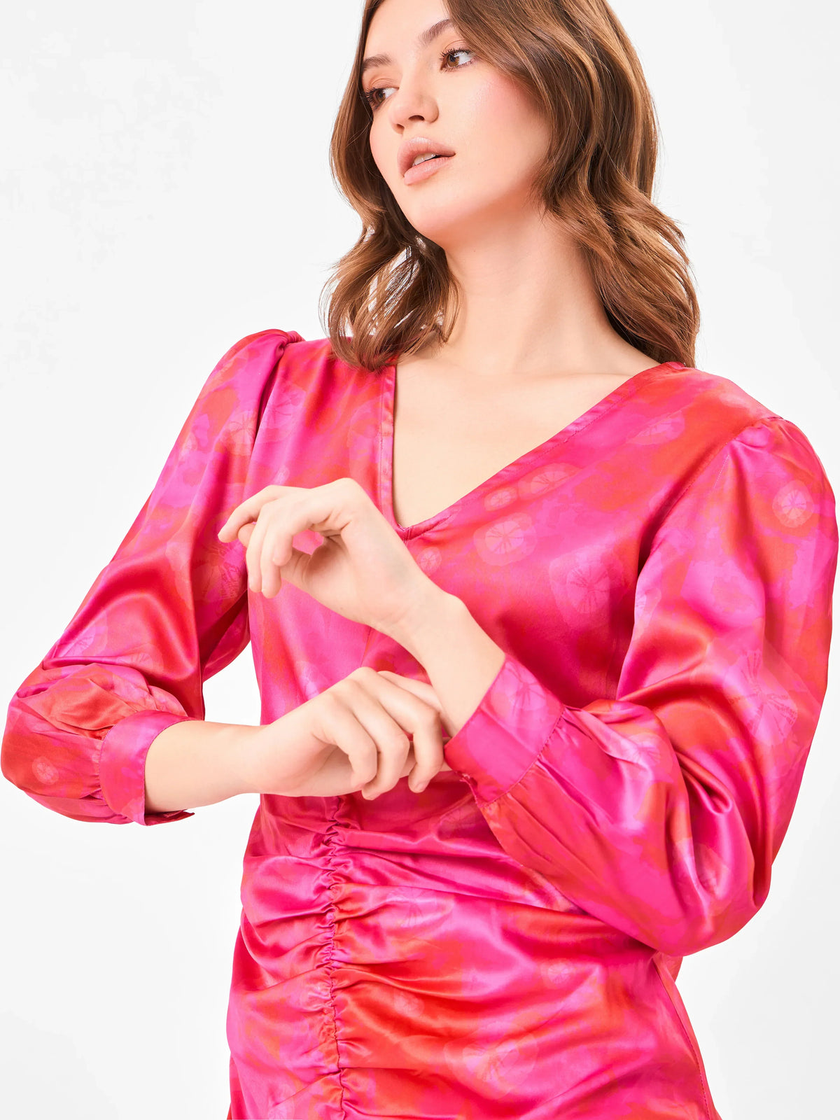Female model wearing a pink tie-dye sheath dress from Stylera