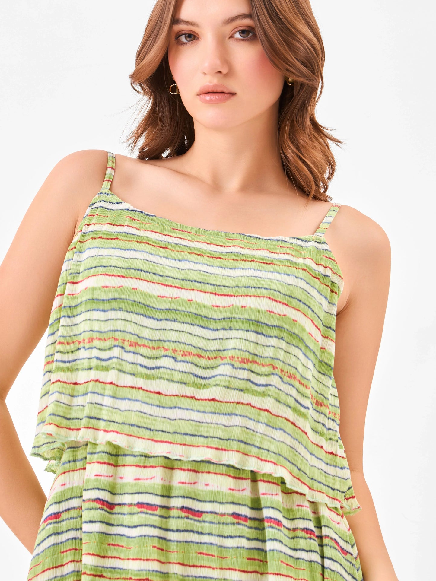 Female model wearing a green square neck striped dress from Stylera