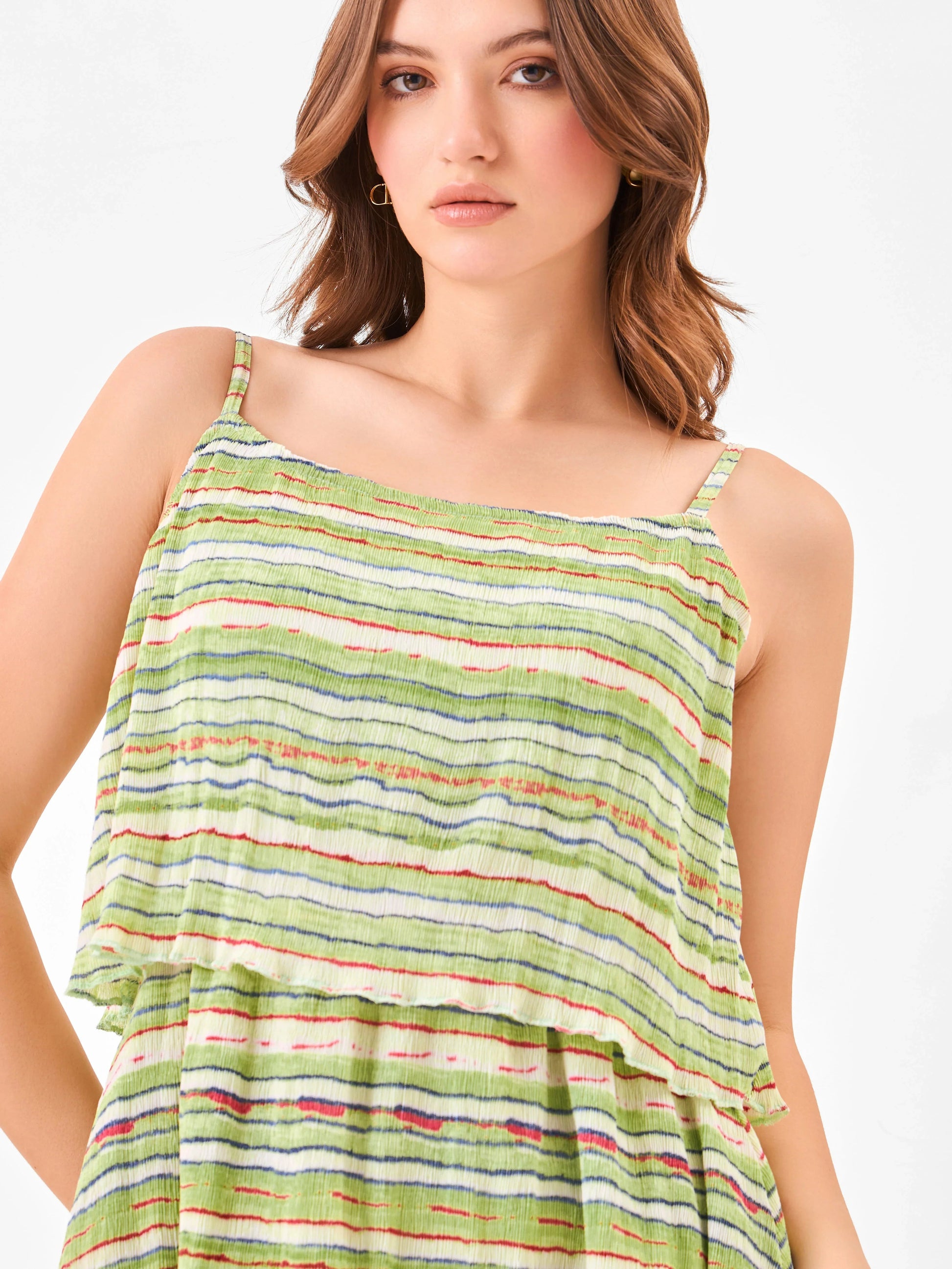 Female model wearing a green square neck striped dress from Stylera