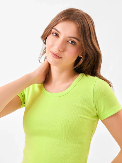 Female model wearing a bright green t-shirt from Stylera