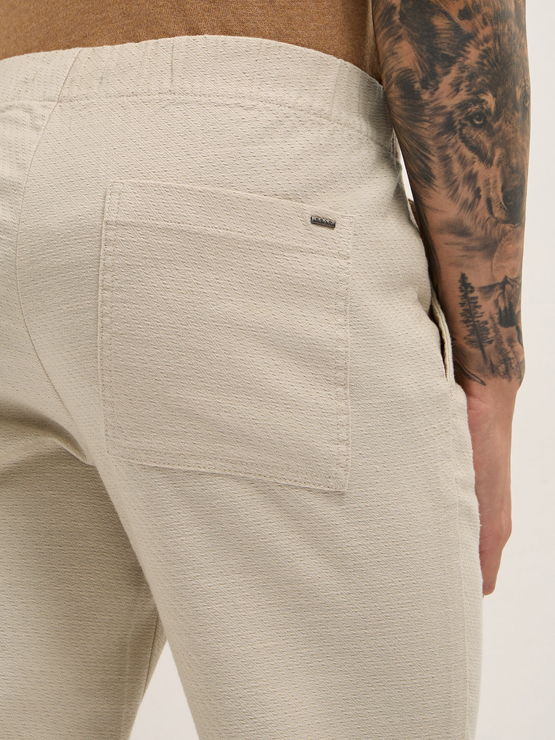Cream Textured Straight Fit Casual Trousers with an Elasticated Waistband