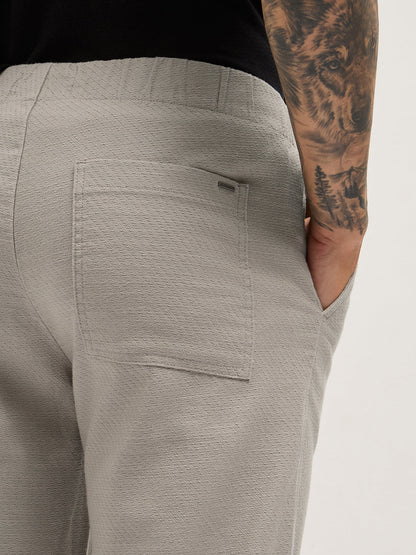 Beige Textured Straight Fit Casual Trousers with an Elasticated Waistband