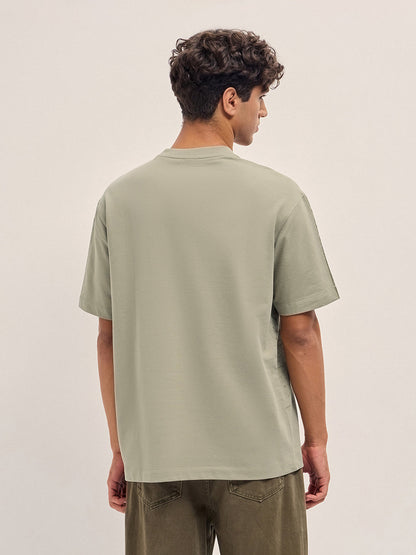 Beige Crew Neck T-Shirt with Abstract Bicycle Graphic Print