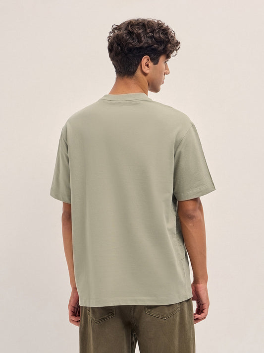 Beige Crew Neck T-Shirt with Abstract Bicycle Graphic Print