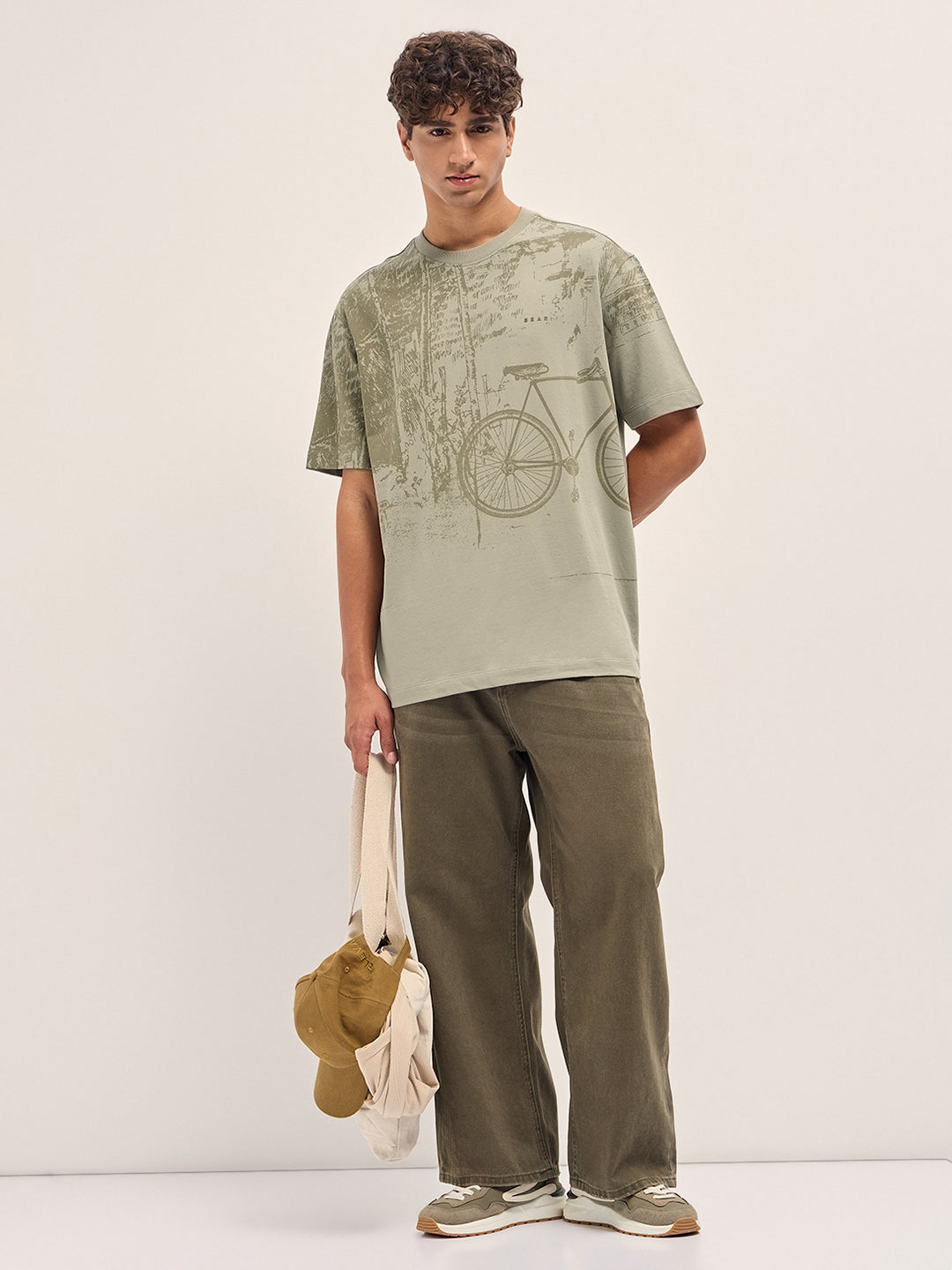 Beige Crew Neck T-Shirt with Abstract Bicycle Graphic Print