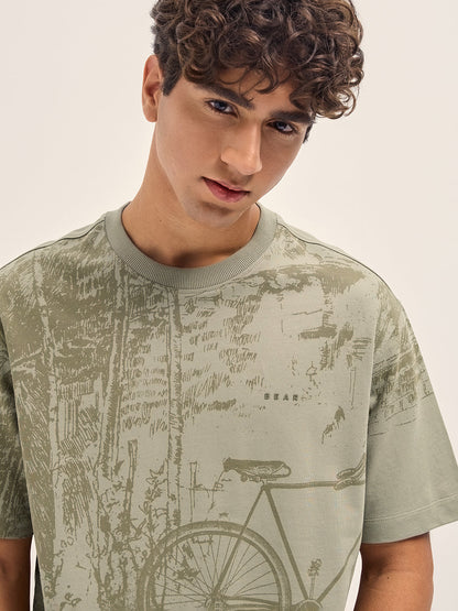 Beige Crew Neck T-Shirt with Abstract Bicycle Graphic Print