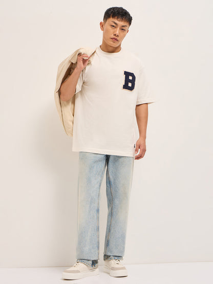 White Oversized Graphic T-Shirt with Chenille Patch and Bold Back Print