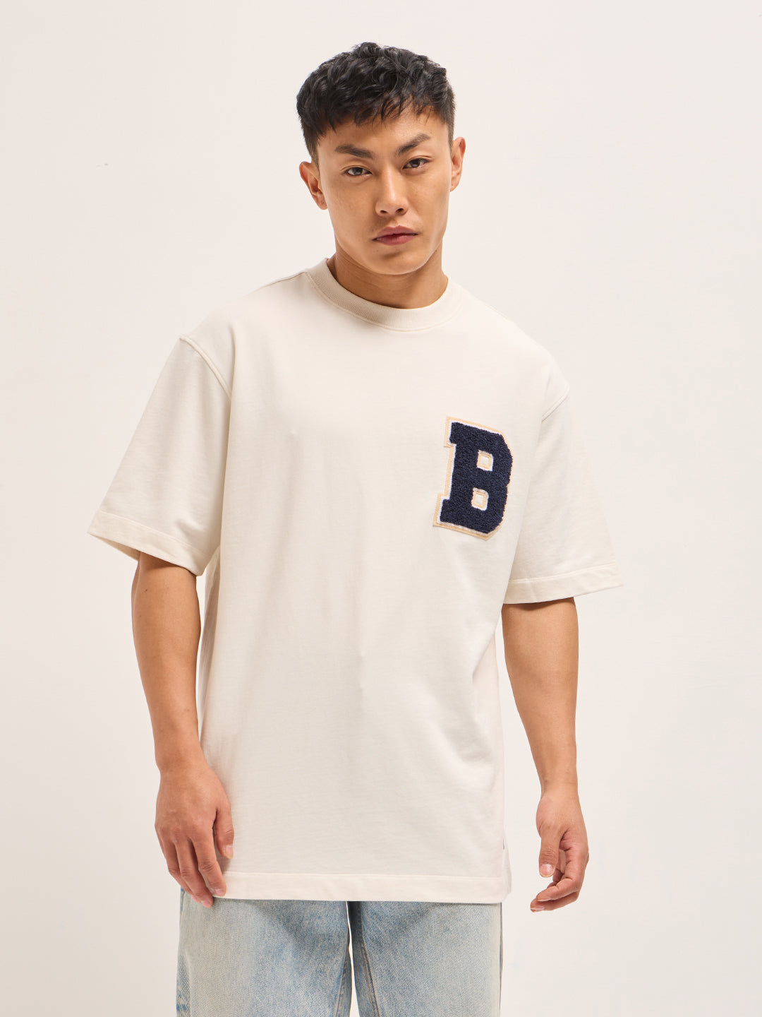 White Oversized Graphic T-Shirt with Chenille Patch and Bold Back Print