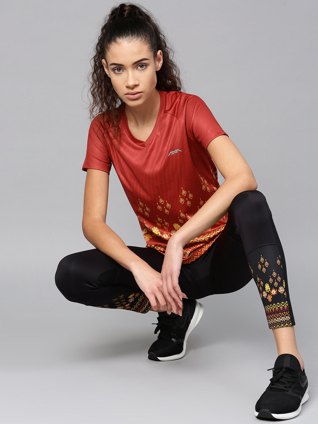 Alcis Women Rust Red Yellow Printed V-Neck T-shirt