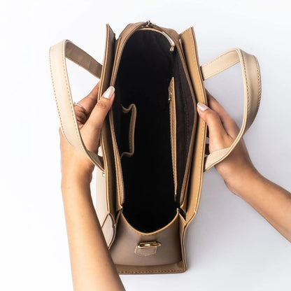Interior view of a beige luxury handbag for women showcasing spacious compartments and elegant design