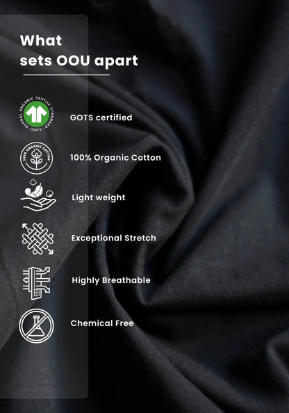 Close-up of charcoal black oversized t-shirt fabric highlighting organic cotton and breathable material