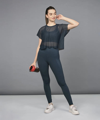 Navy blue breathable workout top with a stylish cropped design, perfect for active wear