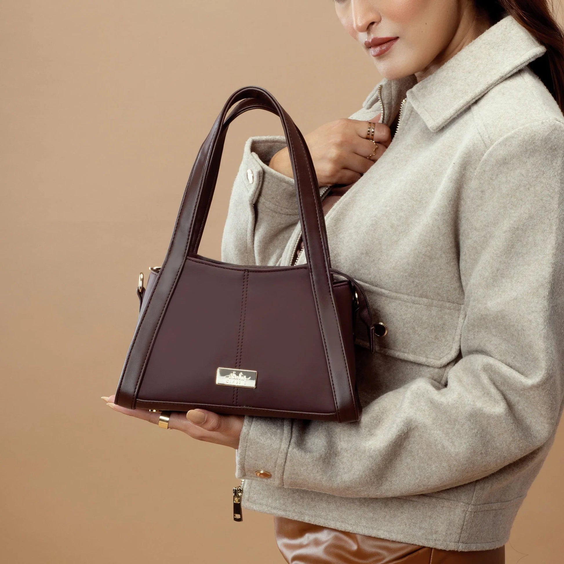 Stylish brown mini purse for women by Stylera with a unique design and elegant straps